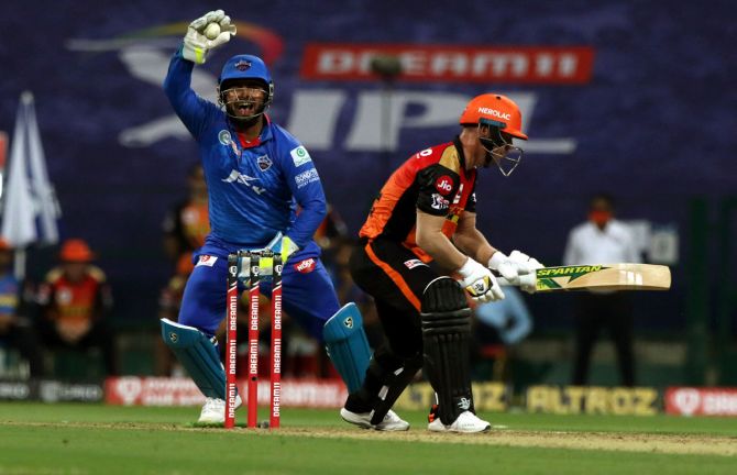 Wicketkeeper Rishabh Pant takes the catch to dismiss SunRisers Hyderabad opener David Warner off Amit Mishra's bowling.