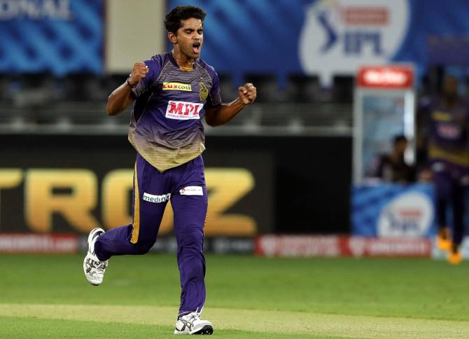 Shivam Mavi celebrates the wicket of Jos Buttler