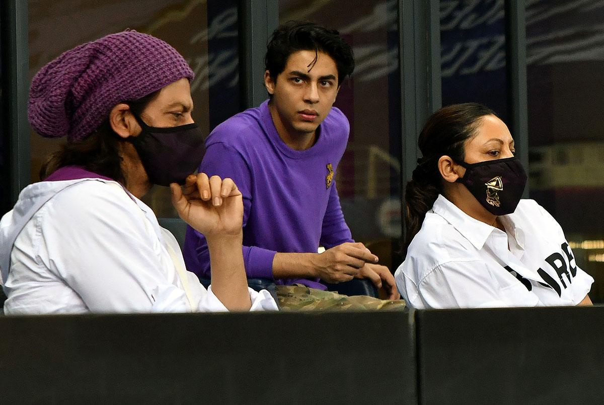 KKR co-owner Shah Rukh Khan with his wife Gauri and son Aryan at the Dubai International Cricket stadium.