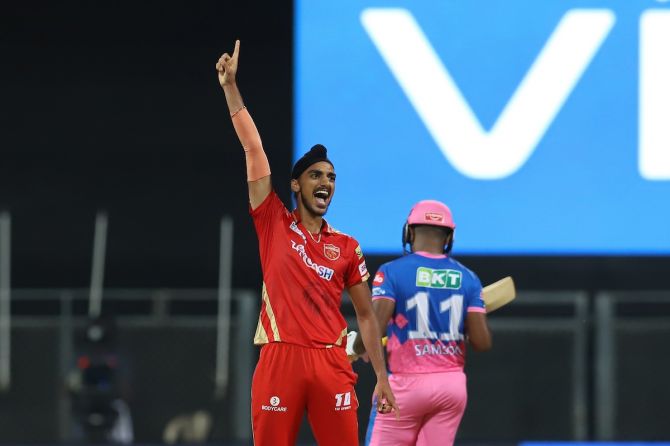 Arshdeep Singh celebrates after dismissing Sanju Samson and clinching victory for Punjab Kings.