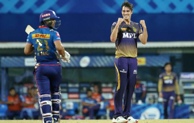 Pat Cummins celebrates the wicket of Ishan Kishan