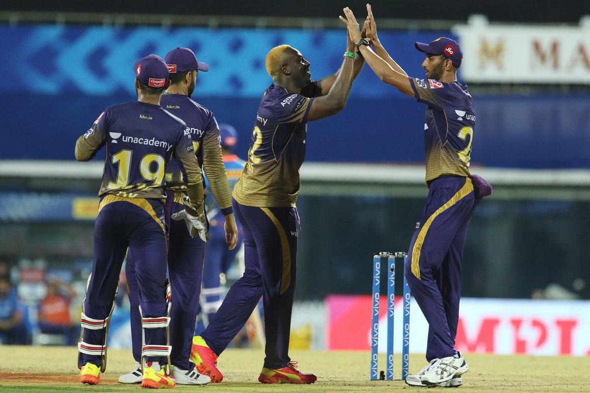 Kolkata Knight Riders pacer Andre Russell celebrates after dismissing Kieron Pollard