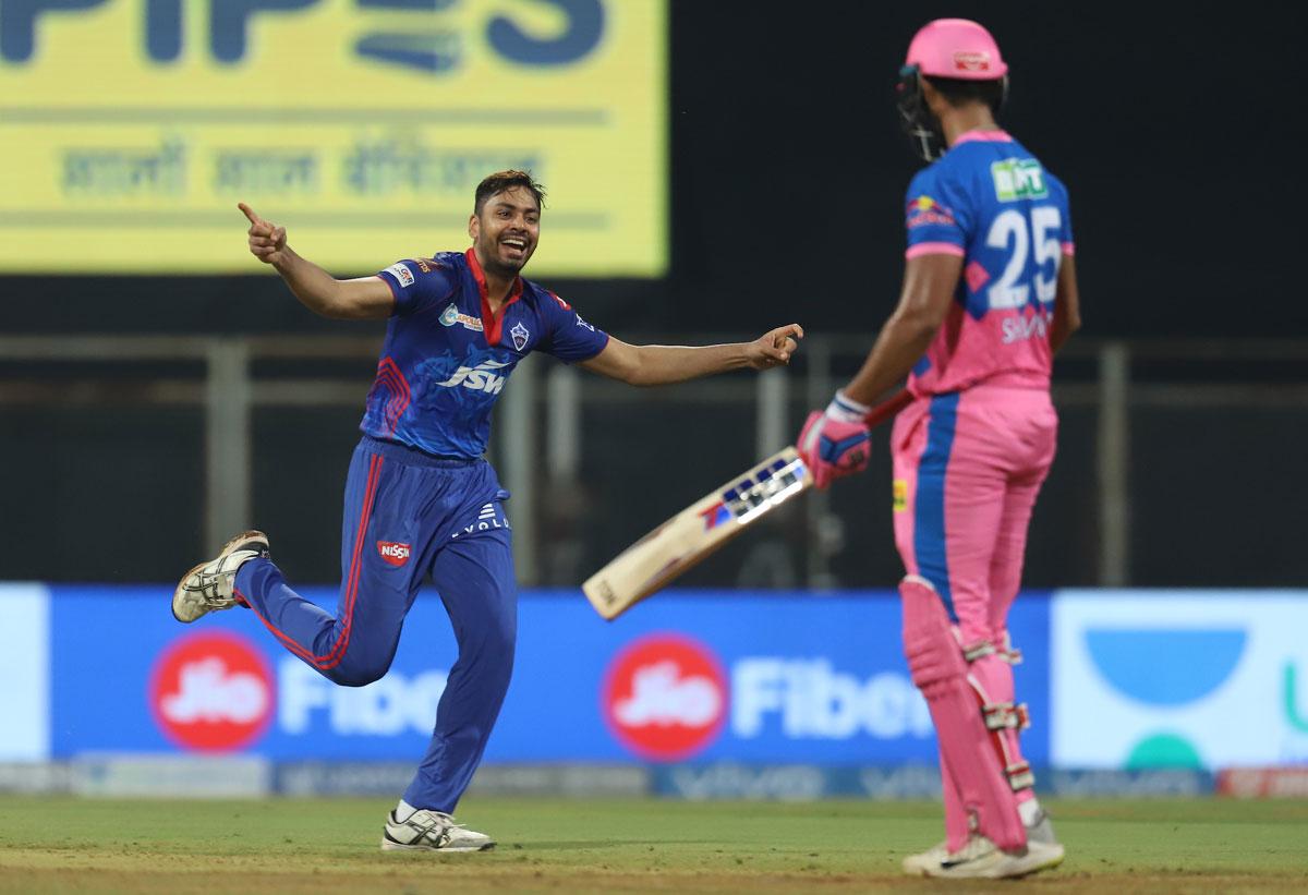 Avesh Khan celebrates the wicket of Shivam Dube