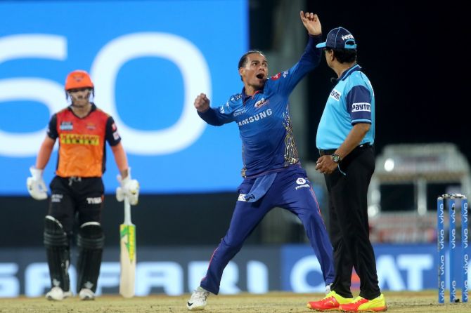 Rahul Chahar celebrates after dismissing Manish Pandey.  He finished with figures of 3 for 19.