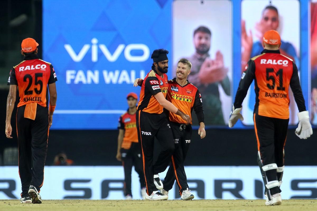 Vijay Shankar is congratulated by David Warner after dismissing Suryakumar Yadav and picking his second wicket.