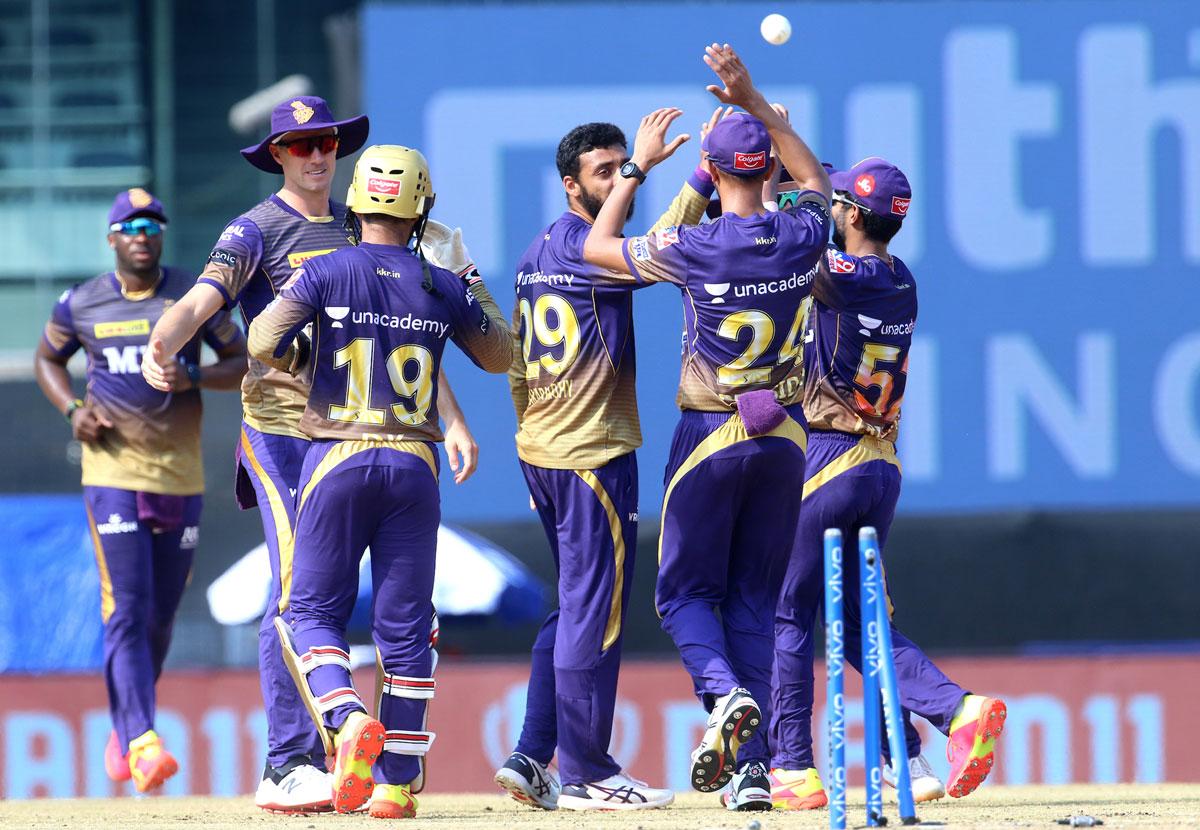 Kolkata Knight Riders players celebrate the wicket of Rajat Patidar.