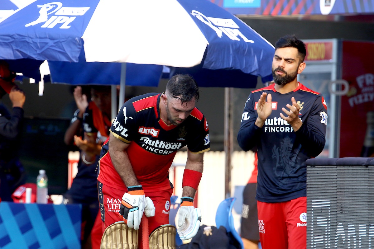 Royal Challengers Bangalore skipper Virat Kohli applauds Glenn Maxwell after his blazing knock against Kolkata Knight Riders in the IPL match, in Chennai, on Sunday. 