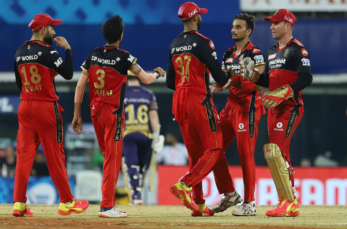 Harshal Patel celebrates the wicket of Eoin Morgan