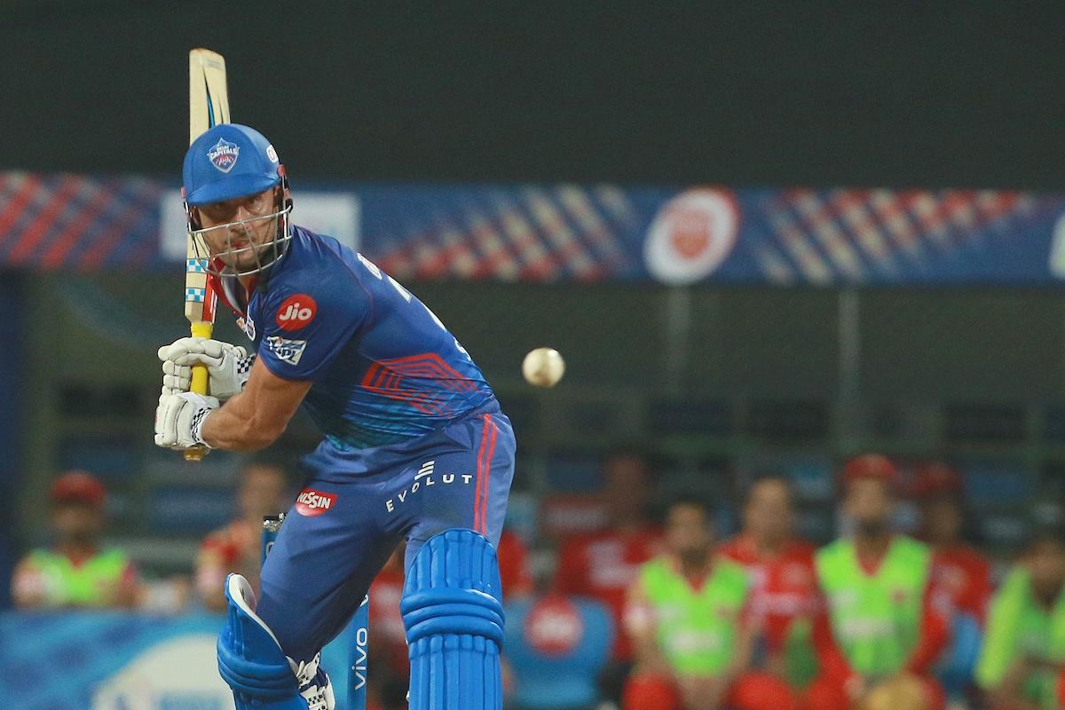 Marcus Stoinis sends the ball over the fence during his late charge against Mohammed Shami.