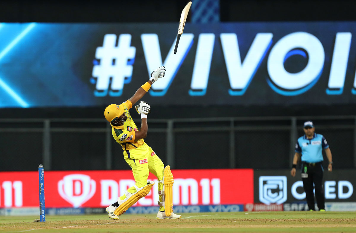 Dwayne Bravo loses his bat as he plays a shot