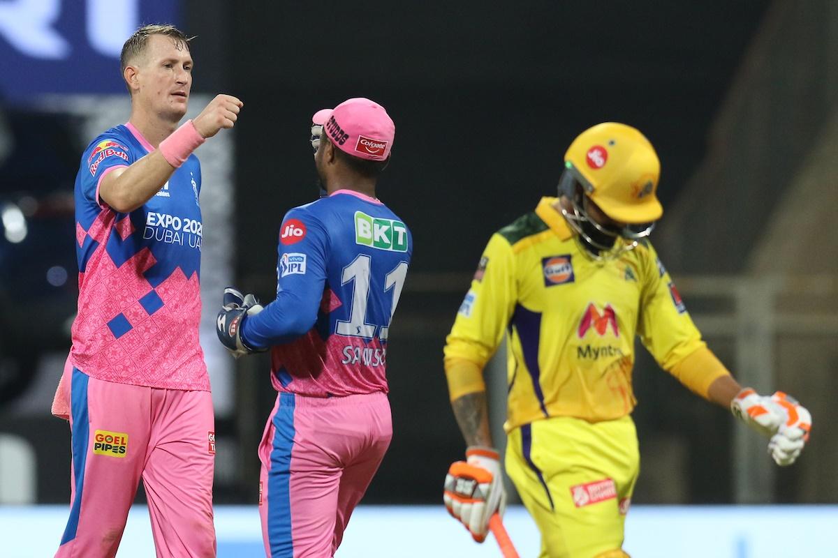 Chris Morris and Sanju Samson celebrate the dismissal of Ravindra Jadeja