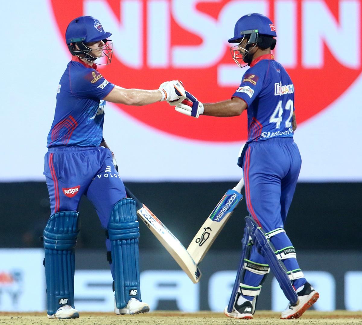 Steven Smith and Shikhar Dawan celebrate a boundary