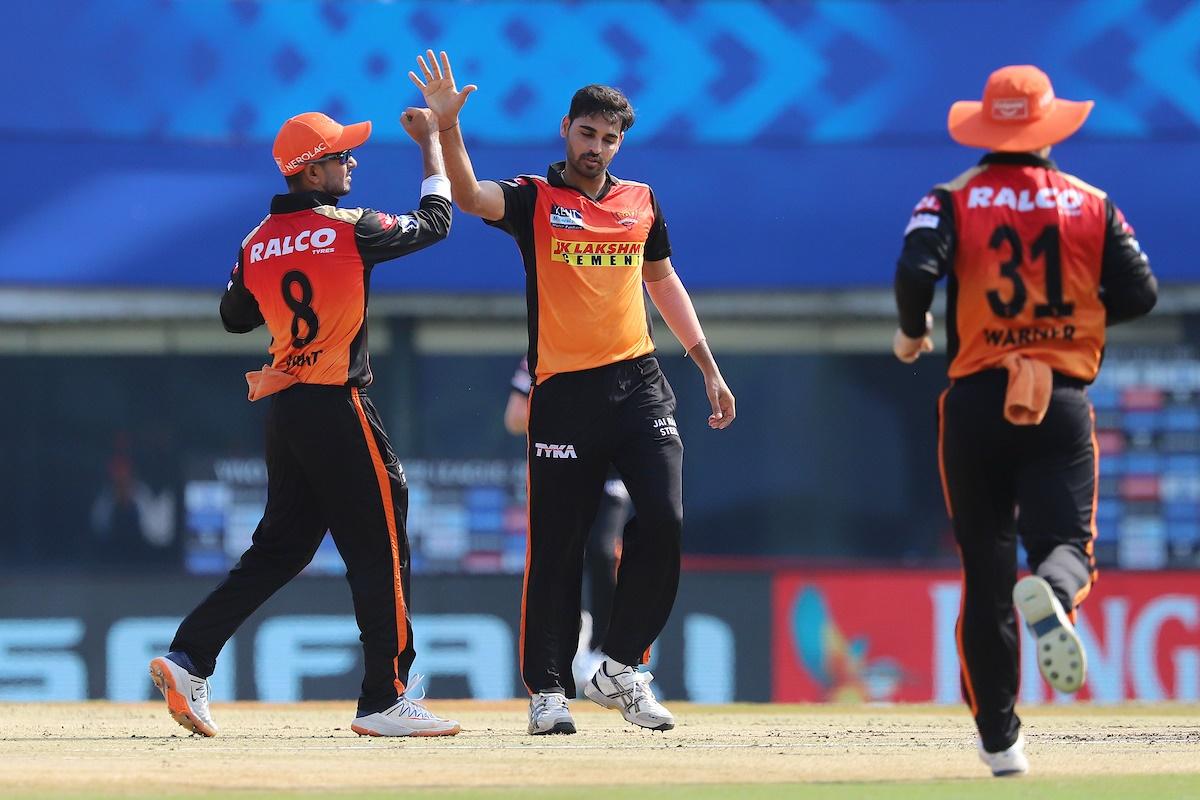 Bhuvneshwar Kumar celebrates with Virat Singh after dismissing K L Rahul