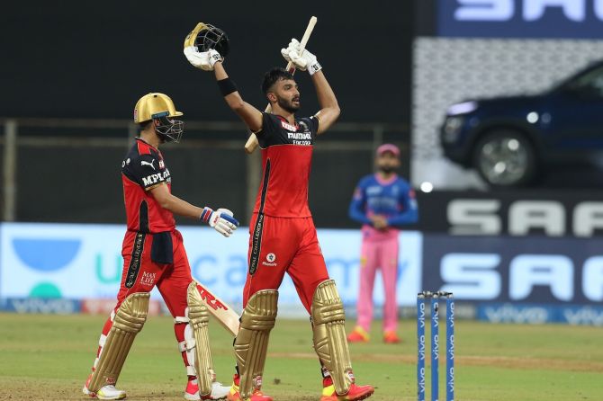 Royal Challengers Bangalore opener Devdutt Padikkal celebrates after scoring a hundred during the IPL match against Rajasthan Royals, in Mumbai, on Thursday.