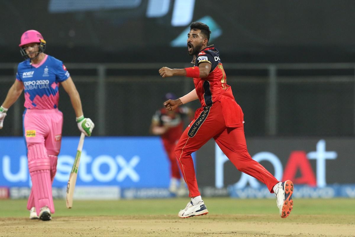 Mohammed Siraj celebrates after dismissing Jos Buttler