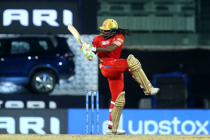 Chris Gayle sends the ball to the boundary