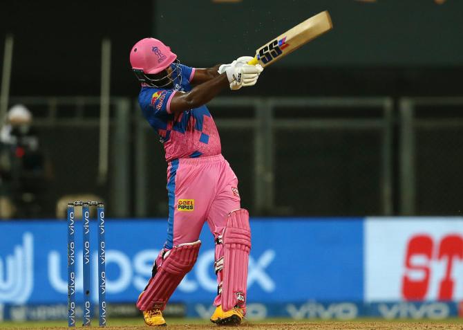 Rajasthan Royals skipper Sanju Samson hits a six during the IPL match against Kolkata Knight Riders in Mumbai on Saturday.