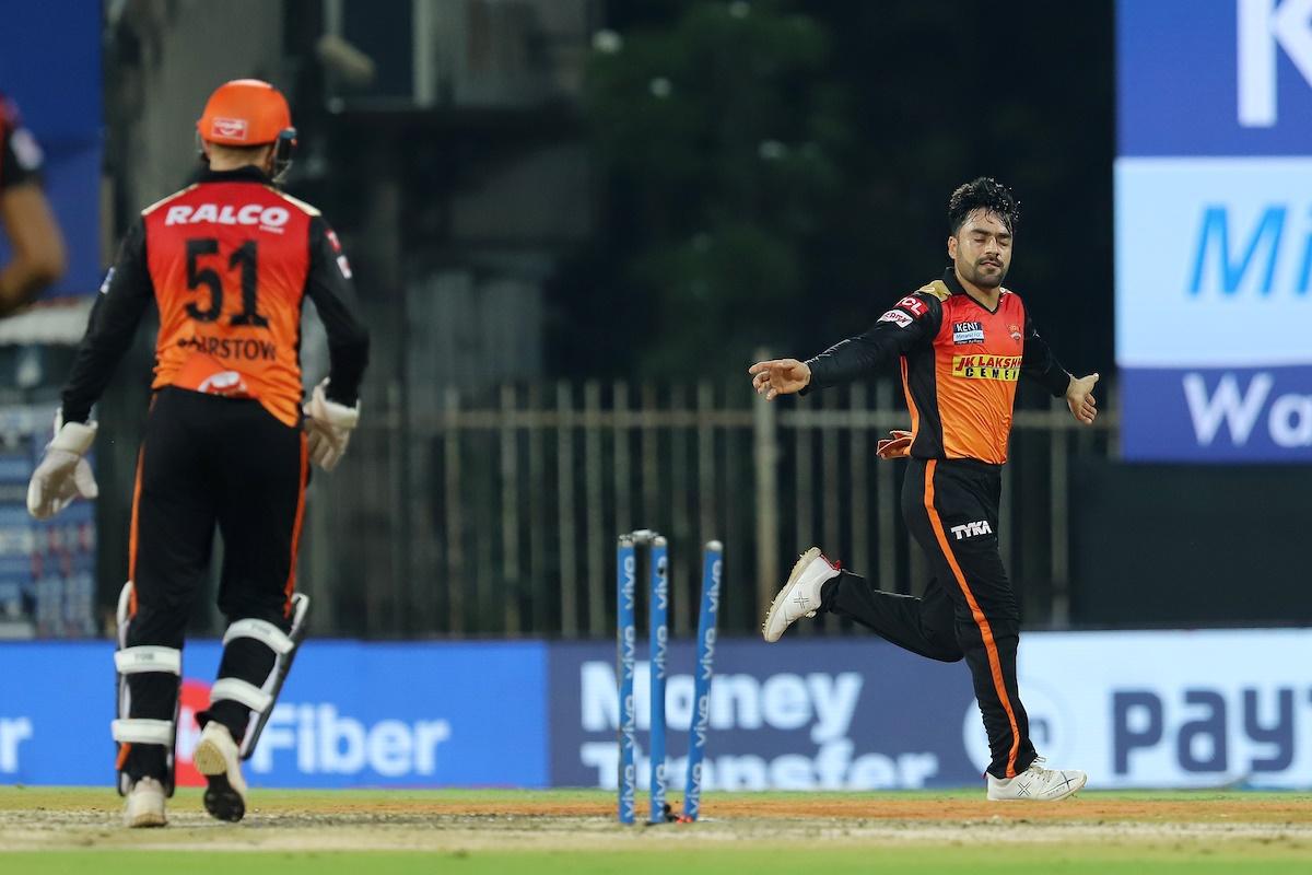 Rashid Khan celebrates the wicket of Shikhar Dhawan.