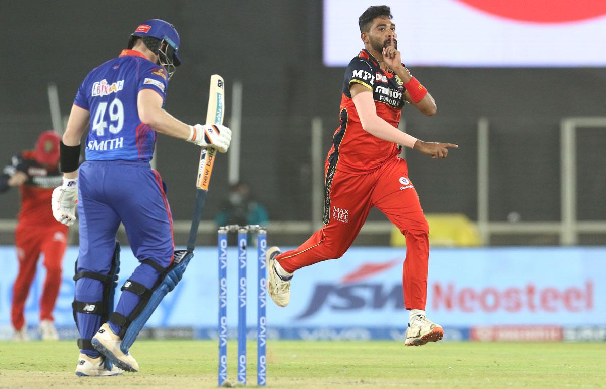 Mohammed Siraj celebrates the wicket of Steve Smith