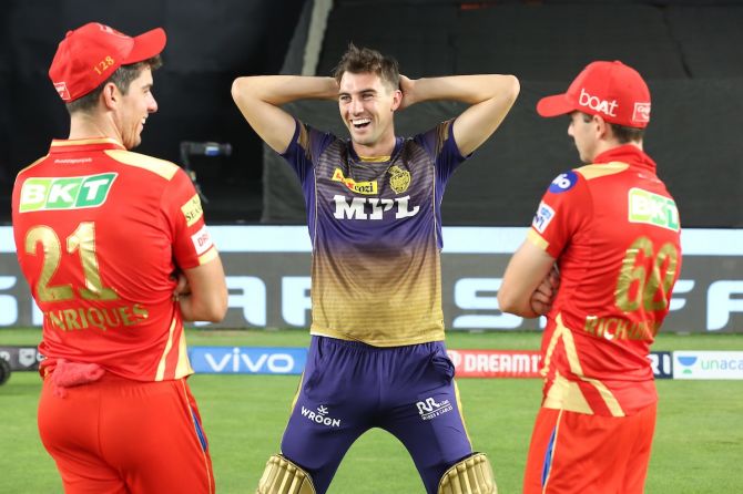 Kolkata Knight Riders pacer Pat Cummins and Moises Henriques of Punjab Kings share a light moment after their IPL match in Ahmedabad on April 26.