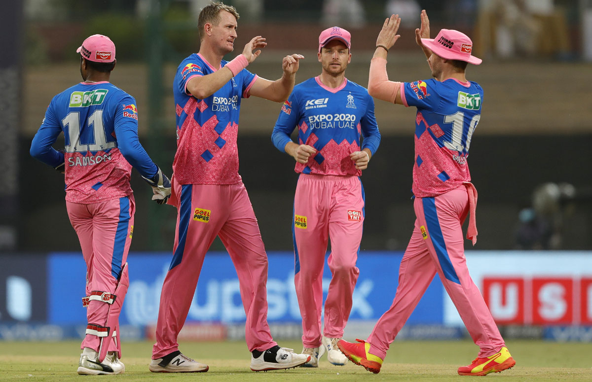 Chris Morris celebrates the wicket of Rohit Sharma