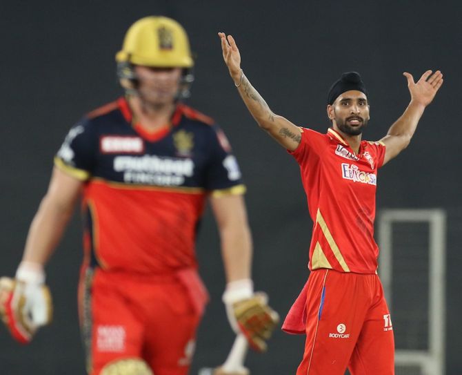 Harpreet Brar celebrates after dismissing Royal Challengers Bangalore batsman A B de Villiers in the IPL match in Ahmedabad on Friday