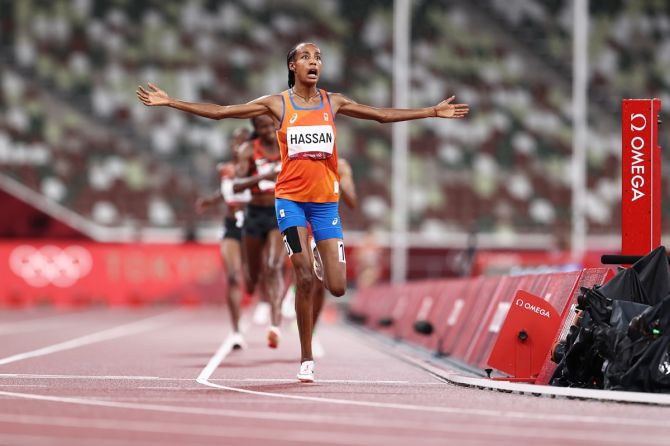 Sifan Hassan of the Netherlands reacts as she breasts the tape to win gold in the Olympics women's 5000 metres at Olympic Stadium, on Monday. 