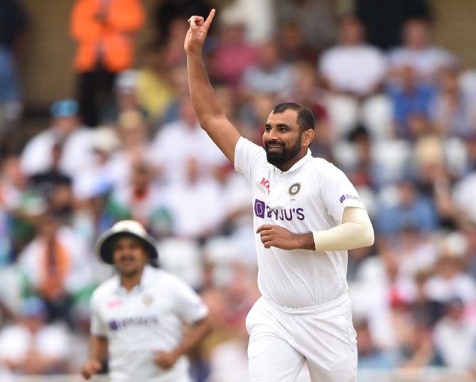 India pacer Mohammed Shami celebrates after dismissing England's Dan Lawrence