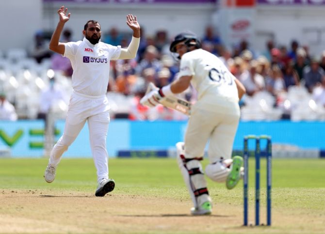 India pacer Mohammed Shami reacts as England's Joe Root hits a single during Day 1 of the first Test at Trent Bridge in Nottingham, on Wednesday.