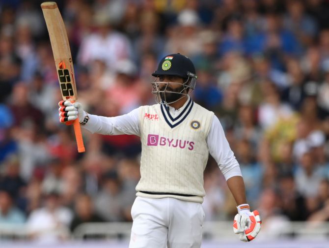 Ravindra Jadeja celebrates after scoring 50.