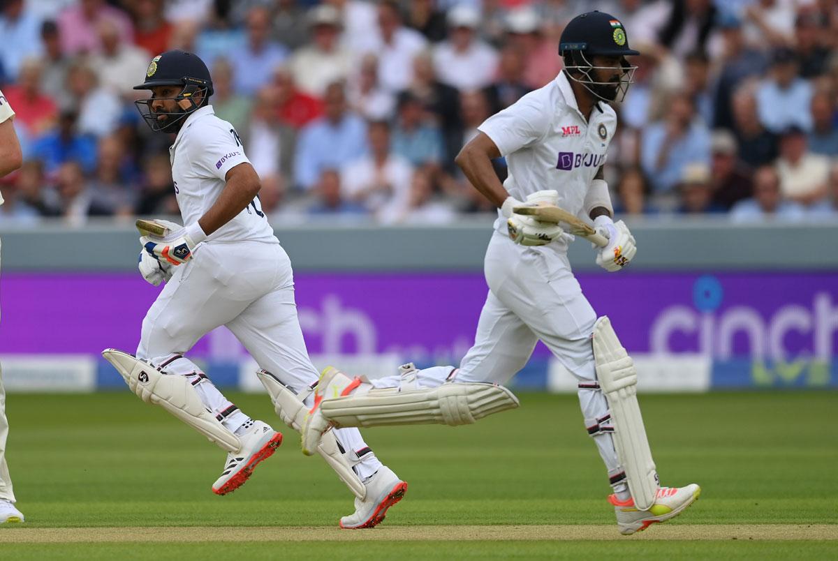 India openers Rohit Sharma, left, and K L Rahul run a quick single as England's Ollie Robinson looks on in the mornng session on Day 1.