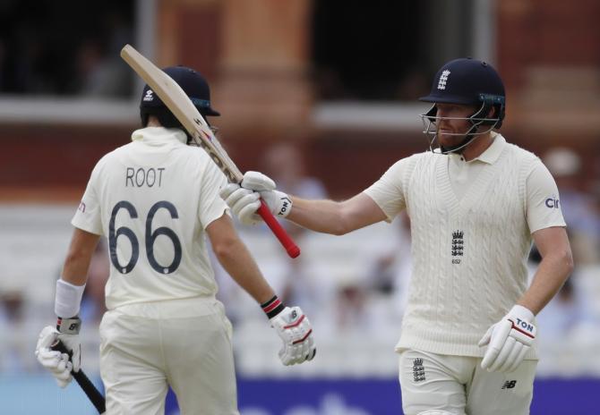 Jonny Bairstow celebrates completing 50