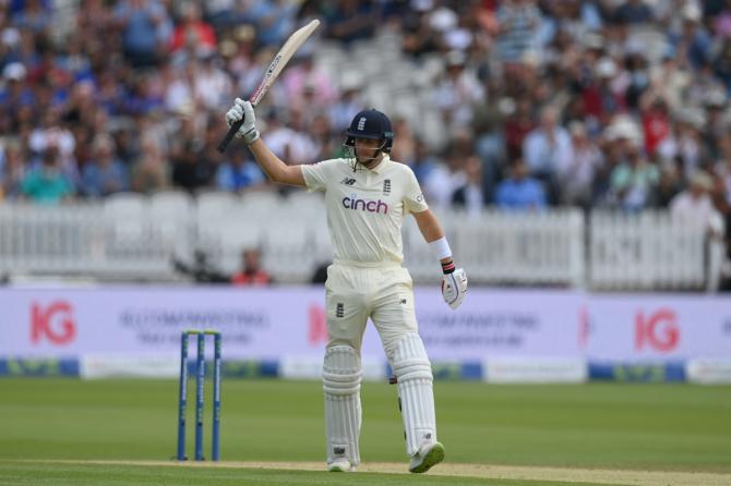 England's Joe Root celebrates after completing 50 on Day 3 of the second Test against India, at Lord's Cricket Ground, on Saturday.