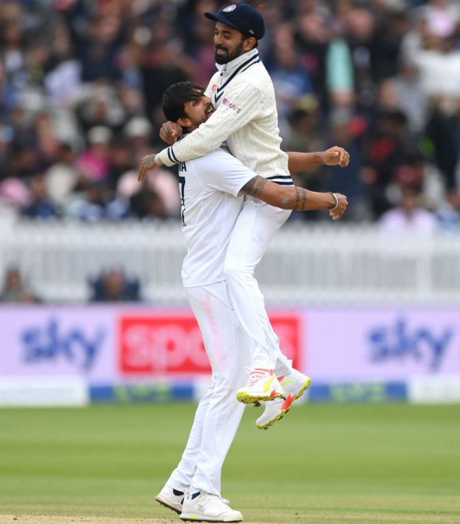 India pacer Ishant Sharma celebrates with K L Rahul after dismissing England's Haseeb Hameed after a review. 