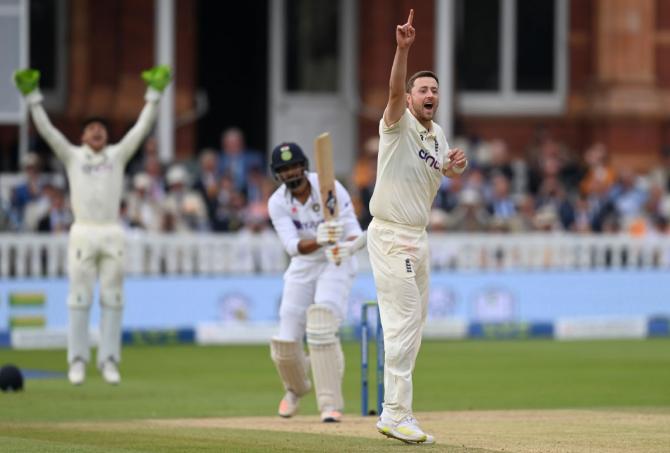 Ollie Robinson successfully appeals for the wicket of Ishant Sharma.