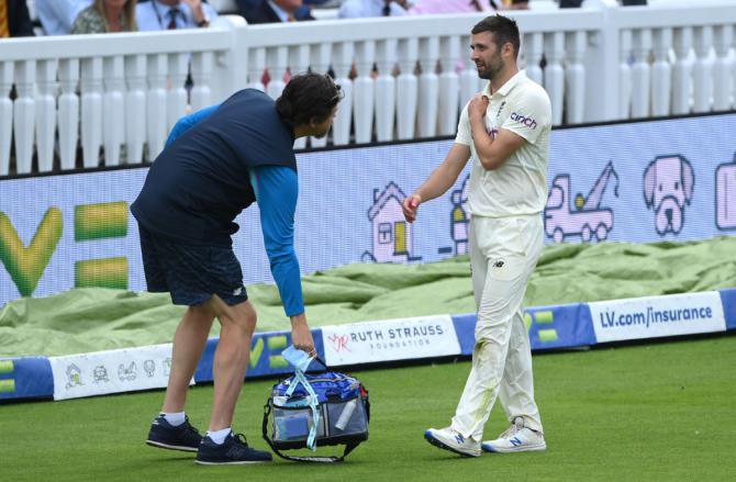 England bowler Mark Wood injures his shoulder after attempting to save a boundary during Day 4 of the second Test against India, at Lord's Cricket Ground, on August 15.