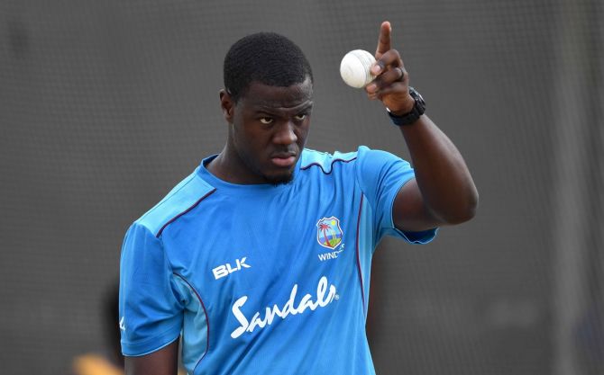 West Indies all-rounder Carlos Brathwaite was forced to enter isolation after a fellow-passenger on a flight from the UK ended up testing positive for Covid-19
