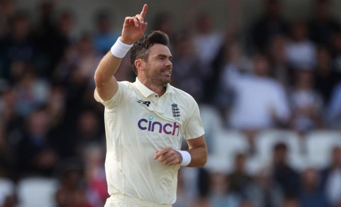  James Anderson celebrates taking the wicket of Virat Kohli.