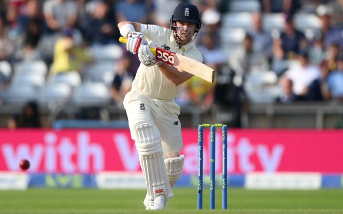 England batsman Rory Burns drives towards the boundary during Day 1 of the third Test, at Emerald Headingley stadium in Leeds, England, on Wednesday.