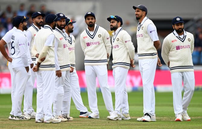 India's players watch the big screen as England's Craig Overton takes the review during Day 3.