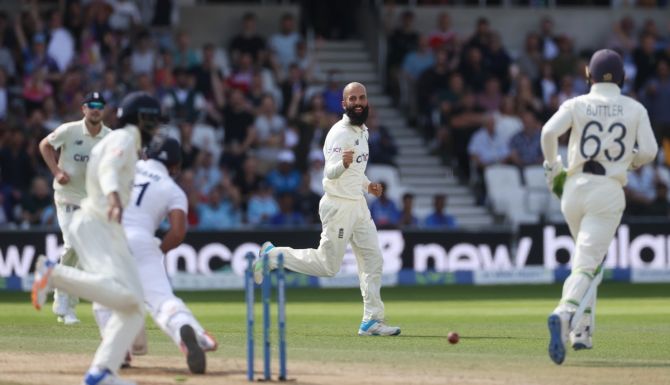 England's Moeen Ali celebrates after taking the wicket of India's Mohammed Shami on Day 4 of the third Test, at Headingley, Leeds, on Saturday.