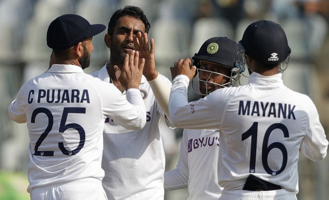 India's players celebrate after Jayant Yadav dismisses Tim Southee