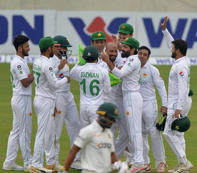Pakistan off-spinner Sajid Khan is congratulated by teammates on claiming a career-best 6 for 35 against Bangladesh on Day 4 of the second Test.