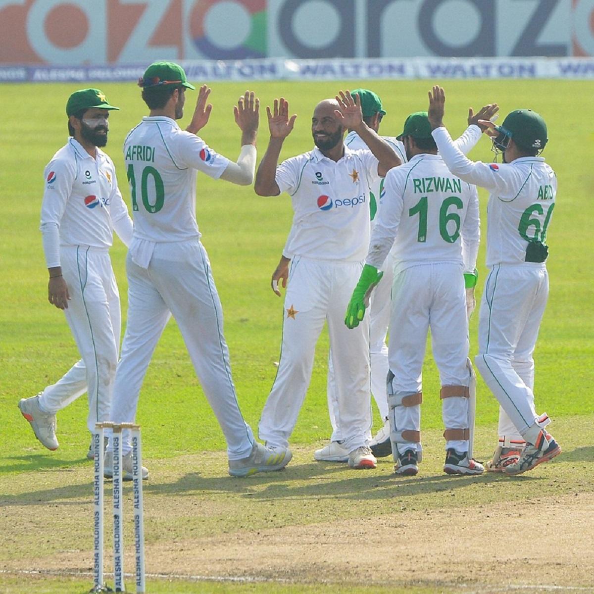 IMAGE: Pakistan spinner Sajid Khan (centre) celebrates with his teammates. Photograph: PCB