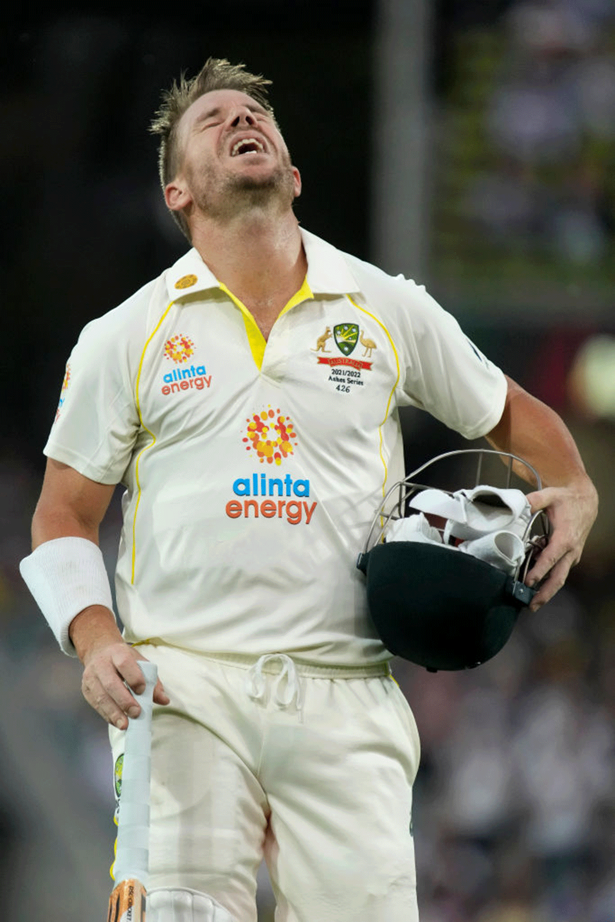 A dejected David Warner walks back after being dismissed for 95