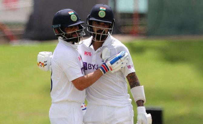 KL Rahul celebrates reaching his half-century with captain Virat Kohli