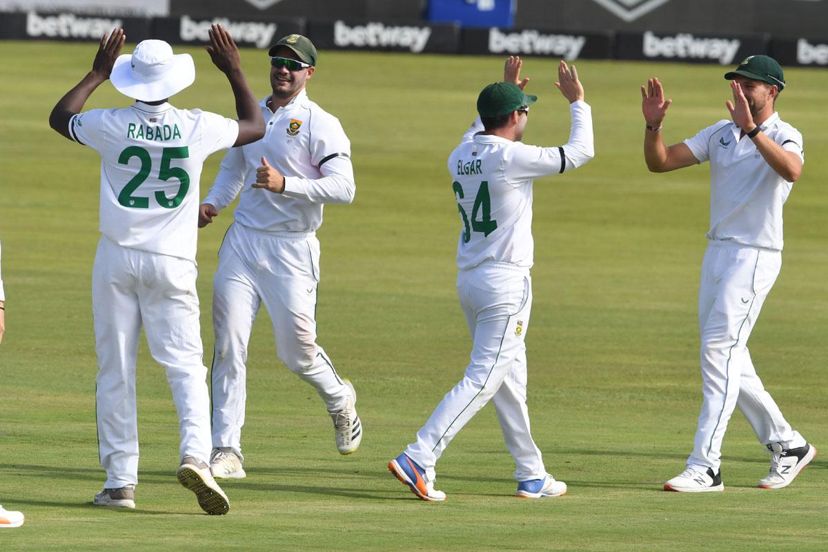 South Africa's players celebrate the dismissal of India captain Virat Kohli.