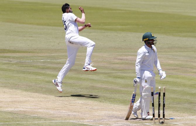 Mohammed Siraj celebrates after taking the wicket of South Africa's Quinton de Kock