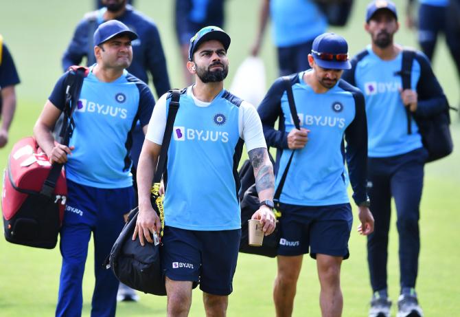 Skipper Virat Kohli and his India teammates get ready for a training session