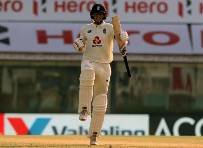 Joe Root celebrates after scoring a hundred